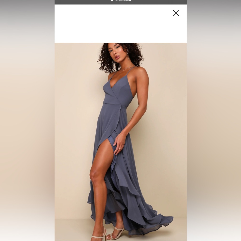 Lulus dress! Worn once to a wedding then dry cleaned, super flattering.